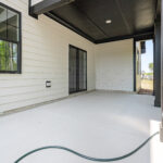Exterior - Rear Porch - Ground Level - DSC06101