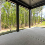 Exterior - Rear Porch - Ground Level - Looking to Trees - DSC06100