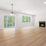 Family Room - Looking Rearward at Fireplace Window and Slider - DSC05913